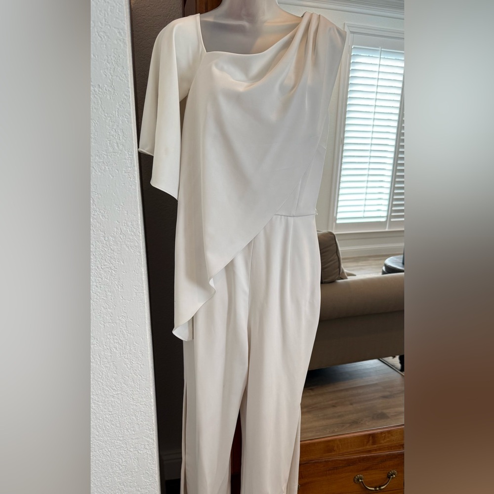 Boston Proper size 8 white jumpsuit, copycat of Melania’s white jumpsuit